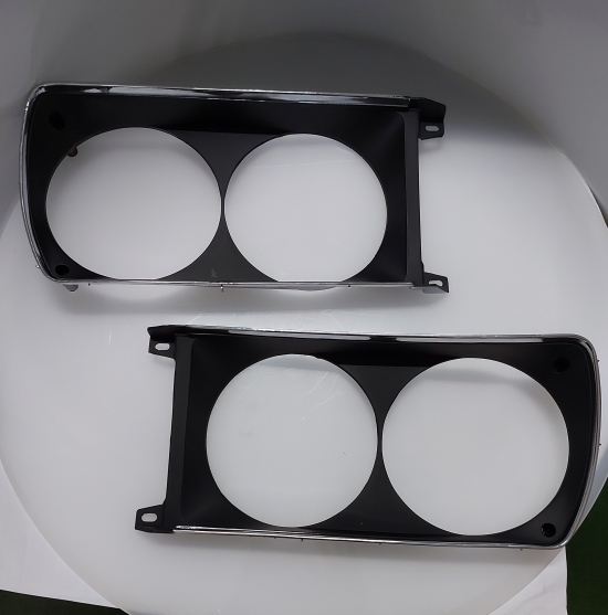 Paar Scheinwerferrahmen Fiat 128 Coupe SL